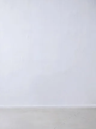An empty studio wall and floor