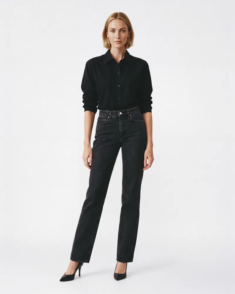 The same black shirt, jeans and pumps on an AI fashion model, made with Mannequin to On-Model or Street to On-Model